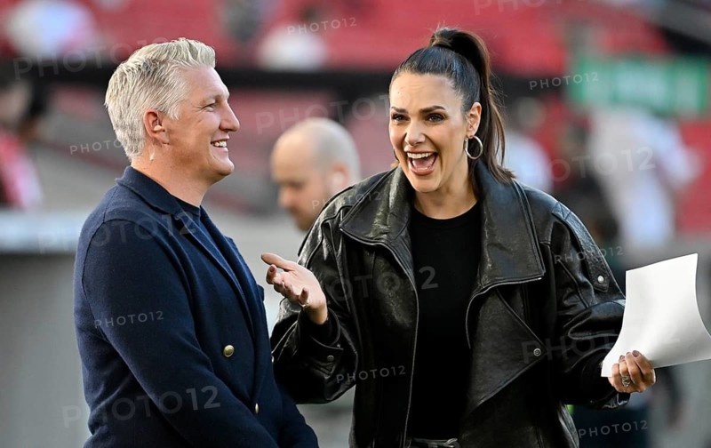 Bastian Schweinsteiger in interview, discussion with presenter reporter ARD Esther Sedlaczek, smiles, soccer Bundesliga, DFB-Pokal, MHPArena, MHP Arena Stuttgart, Baden-Württemberg, Germany