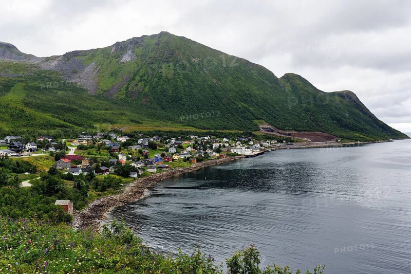 Fishing village Fjordgard, coastline on Ornfjorden fjord, Troms, Norway