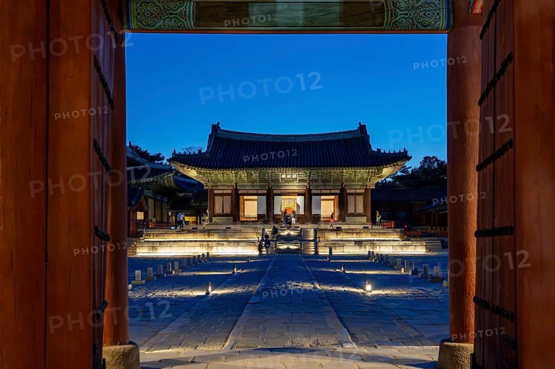 Myeongjeongjeon Hall, jeongjeon, main hall of the 15th century Changgyeonggung Palace illuminated at dusk in the capital city Seoul, South Korea