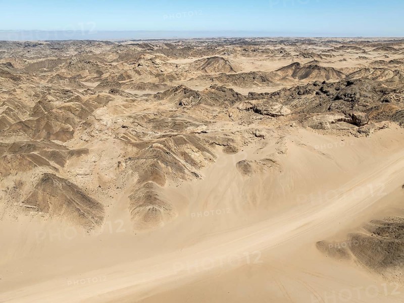 Aerial view, dry barren mountains in Moon Valley, rocky landscape ridged by erosion, Namib-Naukluft Park, Namib Desert, Namibia