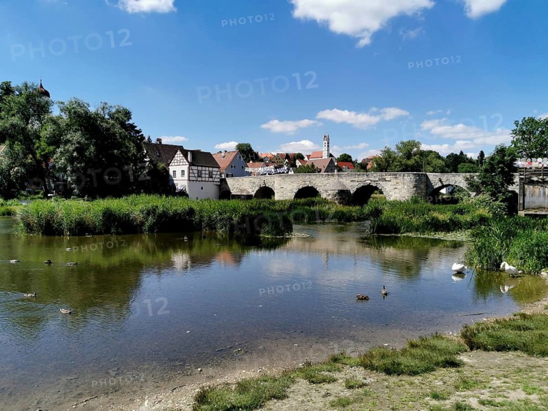 View over the Wörnitz and the old Wörnitz bridge to the town of Harburg, Donau-Ries district, Swabia, Bavaria, Germany