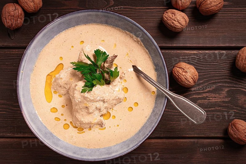 Satsivi, Georgian dish, chicken in nut sauce, cold appetizer, rustic, no people, homemade