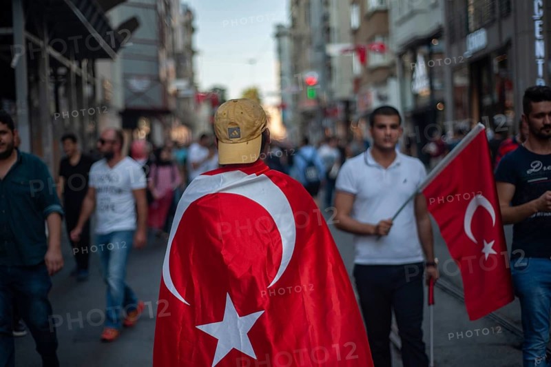 Istanbul, Turkey. 17th July 2016. Crowds take to the streets near Taksim Square, Istanbul, Turkey to celebrate the failure of attempted coup d'état against the Akp ruling government of Recep Tayyip Erdogan