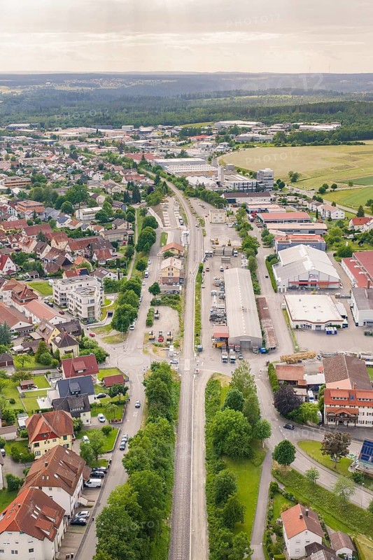 Bird's-eye view of the city, long railway tracks surrounded by buildings and landscape, Hermann Hesse Railway, Althengstett station, Calw district, Germany