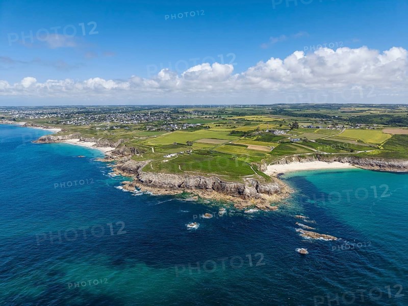 Aerial view of Pointe Corsen, a cape at the westernmost point of continental France on the Breton coast, on the right the beach Plage de Corsen, on the left the beach Plage des Charettes, on the horizon the village of Kervilon, Commune of Plouarzel, Finistère, Brittany, France