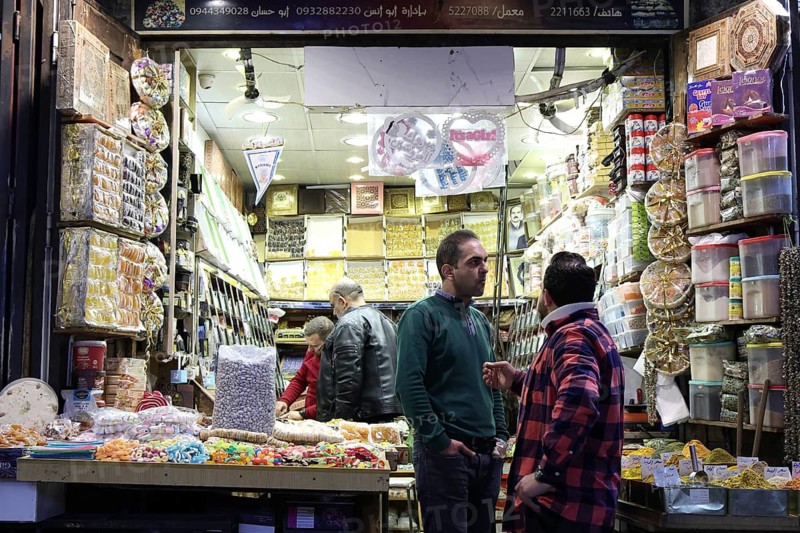 Syrians shop at the historic Al-Hamidiyah Bazaar adjacent to the Umayyad Mosque during the early days of Ramadan in Damascus, Syria on February 18, 2026, Damascus, Syria