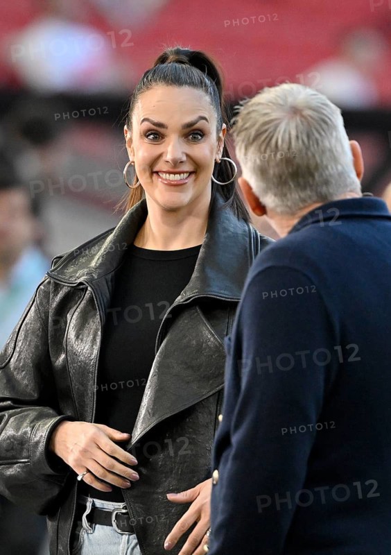 Bastian Schweinsteiger in interview, discussion with presenter reporter ARD Esther Sedlaczek, smiles, soccer Bundesliga, DFB-Pokal, MHPArena, MHP Arena Stuttgart, Baden-Württemberg, Germany