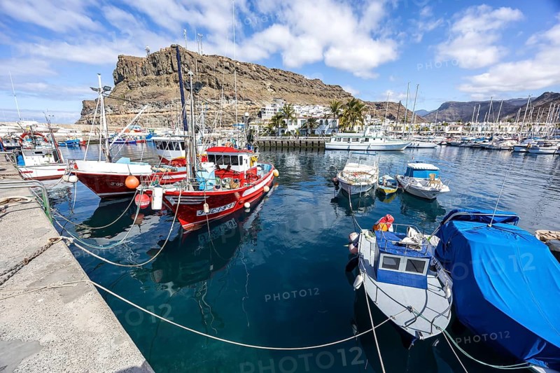 Boats in Puerto de Mogan Harbour on Gran Canaria Canary Islands Vacation Trip in Puerto de Mogán, Spain