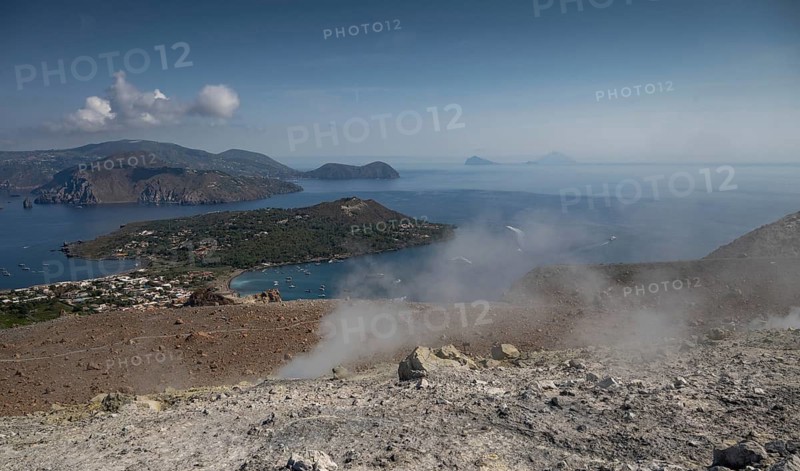 Sulfur vapors, crater rim, Vulcano, in the background Lipari, Panarea and Stromboli, Aeolian or Lipari Islands, Sicily, Southern Italy, Italy