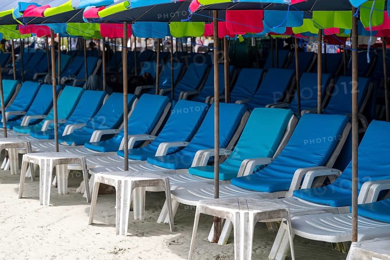 Sun loungers and umbrellas, Koh Larn, Thailand