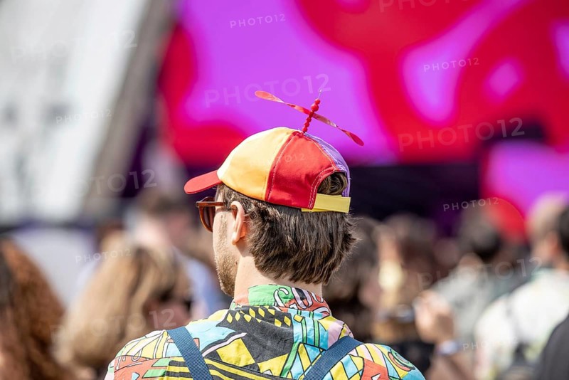 Festival goer wears a cap with propeller at the Lollapalooza Festival on the Olympic Site, Berlin, 18.07.2026