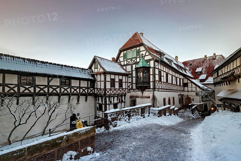 Snowy timber-framed courtyard at dusk, The Wartburg near Eisenach in Thuringia