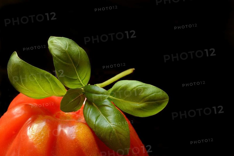 Basil leaf on oxheart tomato