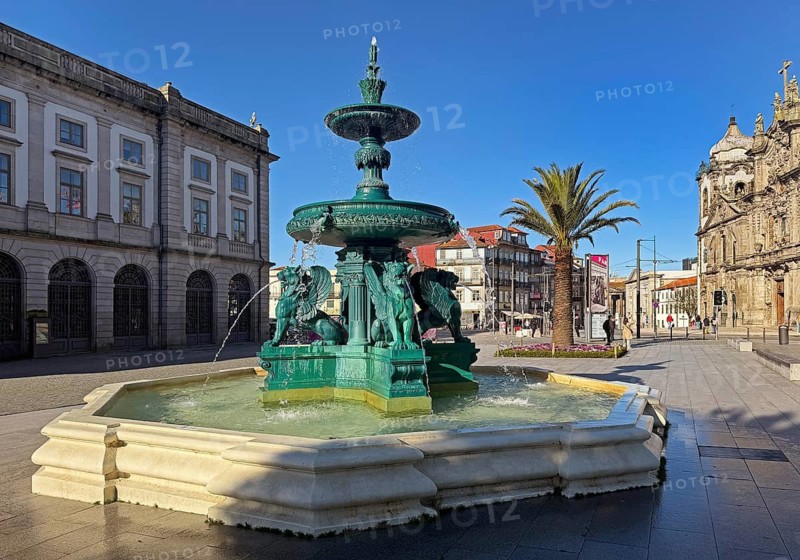 Fonte dos Leoes, Lion's Fountain, on the left the University of Porto, on the right the Igreja do Carmo on Praça de Gomes Teixeira Square, old town, Porto, Portugal