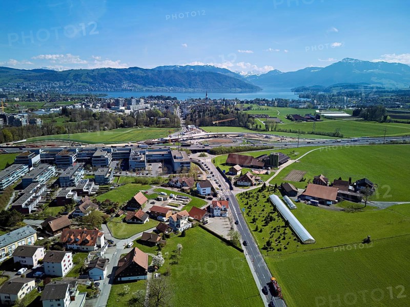 View of Lindencham with the motorway entrance, Lake Zug and Mount Rigi in the back, Cham, Canton of Zug, Switzerland
