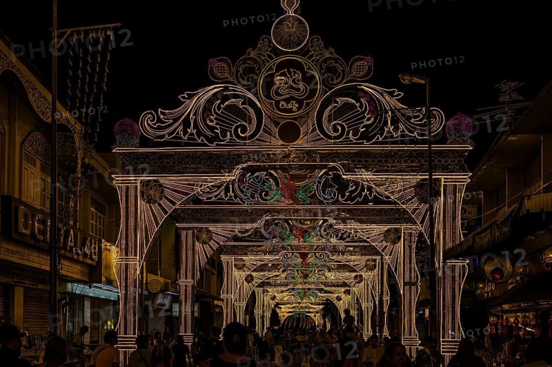 Large trains and luxurious street lighting in a pedestrian zone, night view, old city center, Chiang Mai, Thailand