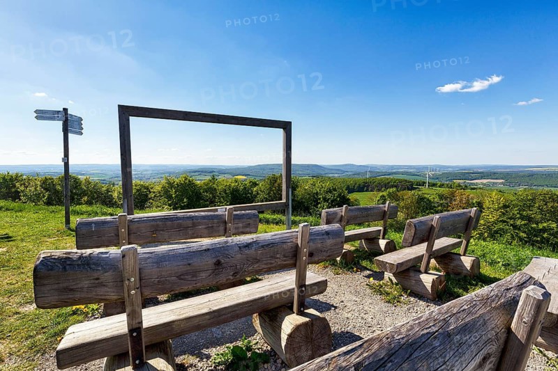 Wooden rest benches on mountain peaks, open-air cinema, panoramic view of the Weser Hills, landscape, forests and fields, rest area for hikers, viewpoint, Köterberg, Lügde, North Rhine-Westphalia, Germany
