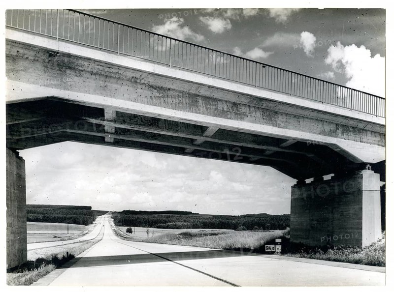 Reichsautibahn, Schleitz, Bayreuth, Bavaria, photo of a bridge over a country road with a wide view of the landscape, geometric and clear, Else Hege