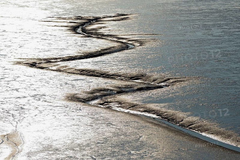North Sea, a creeks through the Wadden Sea at low tide, Norddeich, Lower Saxony, Germany