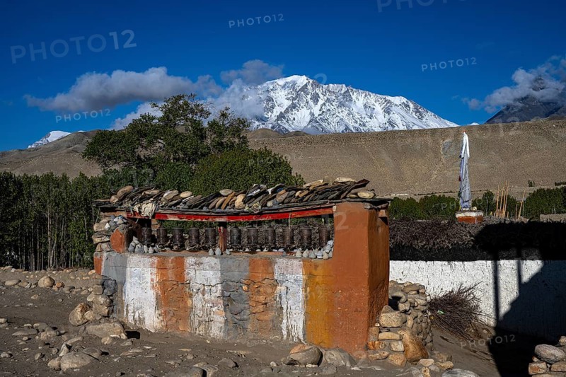 Buddhist prayer wheels and manistones, Tsarang, Mustang, Upper Mustang, Himalayas, Nepal