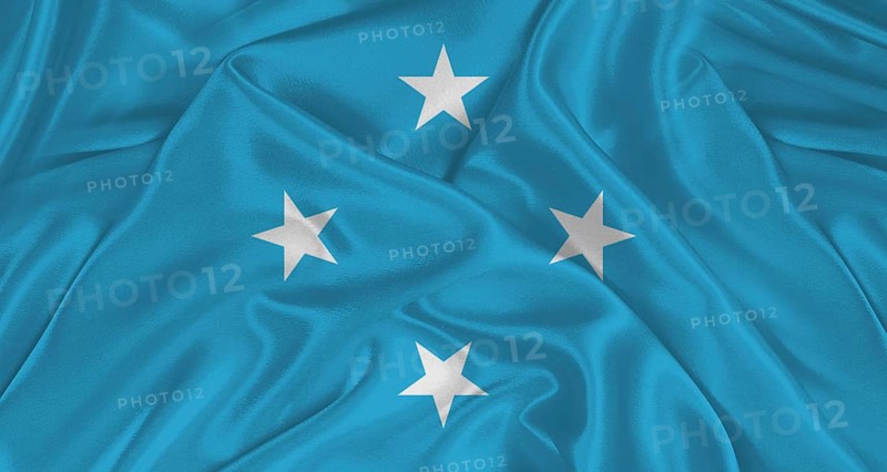 Micronesian flag with fabric texture. Realistic flag of Micronesia waving, National flag