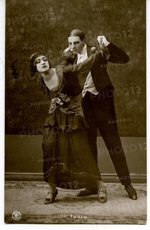 Tango, dance pose, twenties, couple dance with intensive pose in tango style, presented in sepia tones, around 1920