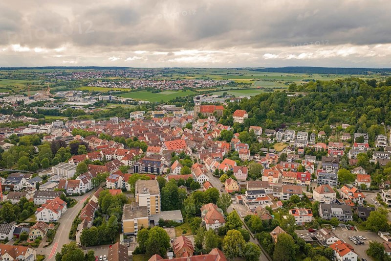 City landscape with old architecture and a church in the midst of rural surroundings, Herrenberg, Böblingen district, Germany