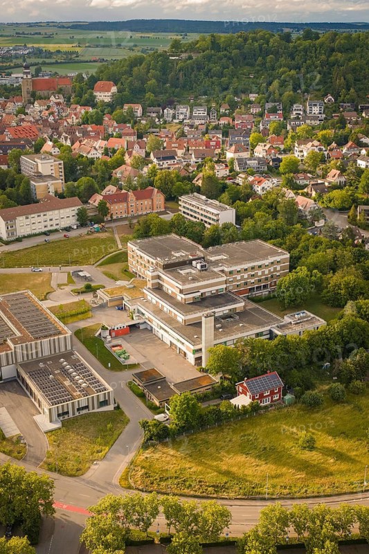 Urban environment with a large building in the foreground and residential buildings in the background, new IGZ, The Integrated Health Center Herrenberg, former Herrenberg Hospital, Böblingen district, Germany