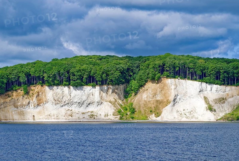 Chalk coast of the island of Rügen under heavily cloudy skies. Sassnitz. Mecklenburg-Vorpommern, Germany