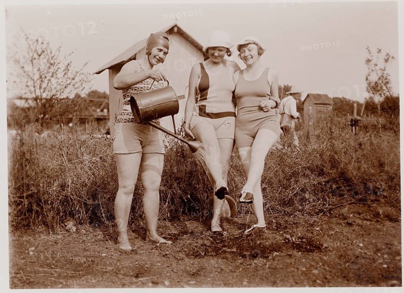 Allotment garden, swimwear, Three woman in swimwear gardening and laughing in natural surroundings, humor, summer, around 1926