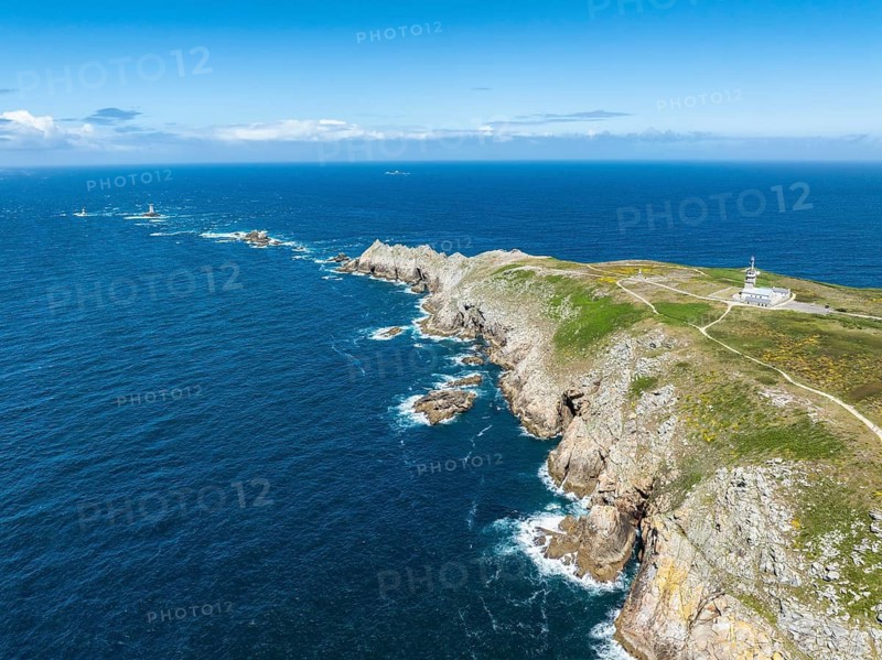 Aerial view of Pointe du Raz with the Sémaphore de la Pointe du Raz, on the left horizon the Phare de la Vieille lighthouse on a rocky island, Pointe du Raz, Finistère, Brittany, France