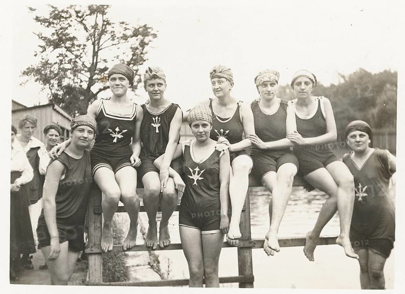Bathing, swimwear, woman, leisure, fun, summer, group of woman in bathing suits posing smiling on a railing at the swimming pool, swimming club, around 1925