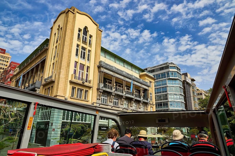 City view with tourists in an open bus and diverse architecture, capital city, Santa Cruz de Tenerife, Santa Cruz, Tenerife, Canary Islands, Spain