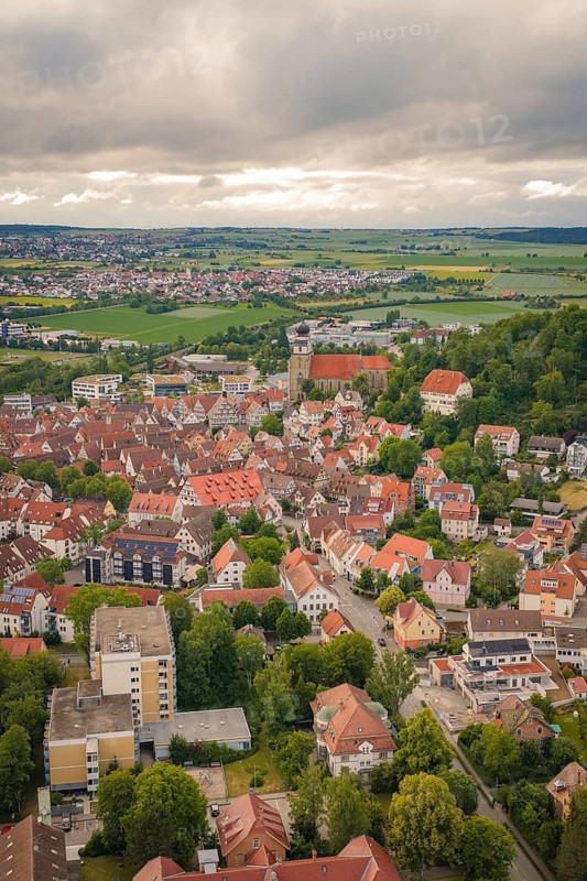 Historic town with many old buildings and a church, under a cloudy sky, Herrenberg, Böblingen district, Germany