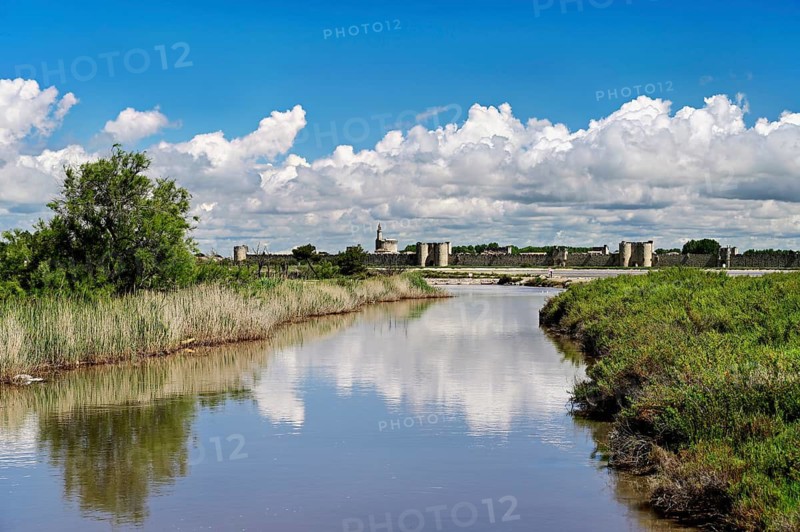 Salins du Midi, behind the historic city walls, Aigues-Mortes, Camargue, southern France, France
