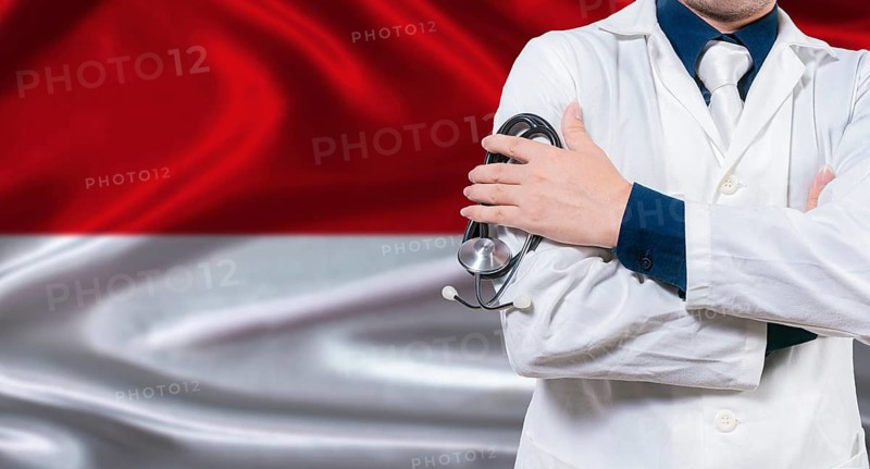 Monegasque national health system, Medical professional holding sthetoscope isolated