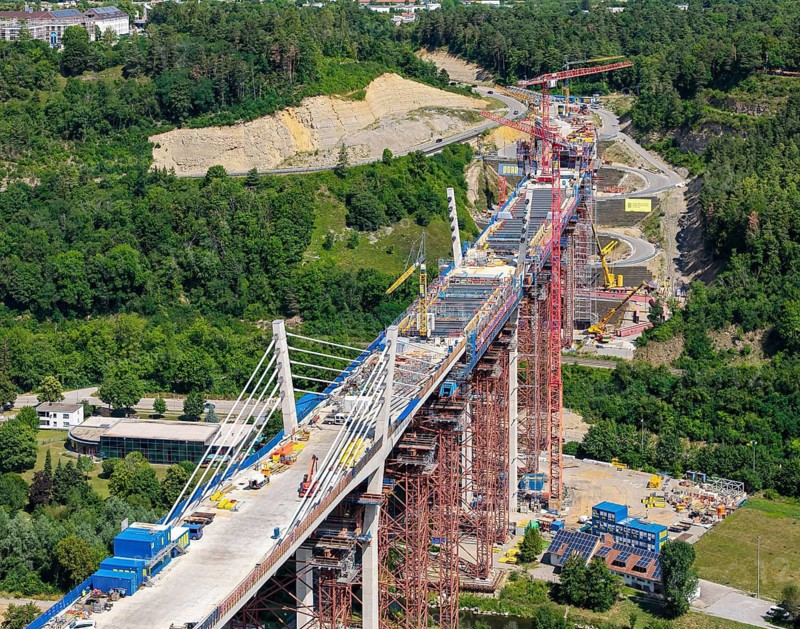 Horb high bridge construction site. After completion in 2028, the bridge will relieve the city of Horb from through traffic. The 667 meter long and up to 90 meters high Neckar Valley Bridge on the B 32 federal road is expected to cost around 167 million euros. Drone photo. Horb am Neckar, Baden-Württemberg, Germany