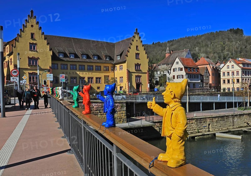 Tauber Bridge, sculptures by Ottmar Hörl depicting the ‘Wertheim Optimist', the artwork featuring the thumbs-up gesture was created in autumn 2020 as an optimistic symbol of solidarity and hope during the COVID-19 pandemic, Wertheim, Main-Tauber district, Baden-Württemberg, Germany (permanent public artwork)