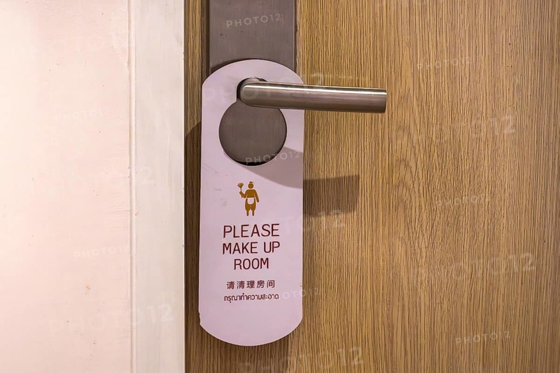 Hotel door trap sign please clean rooms, Bangkok, Thailand