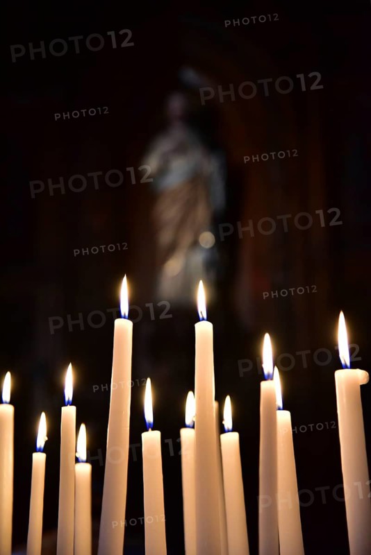 Sacrificial candles in a church, France