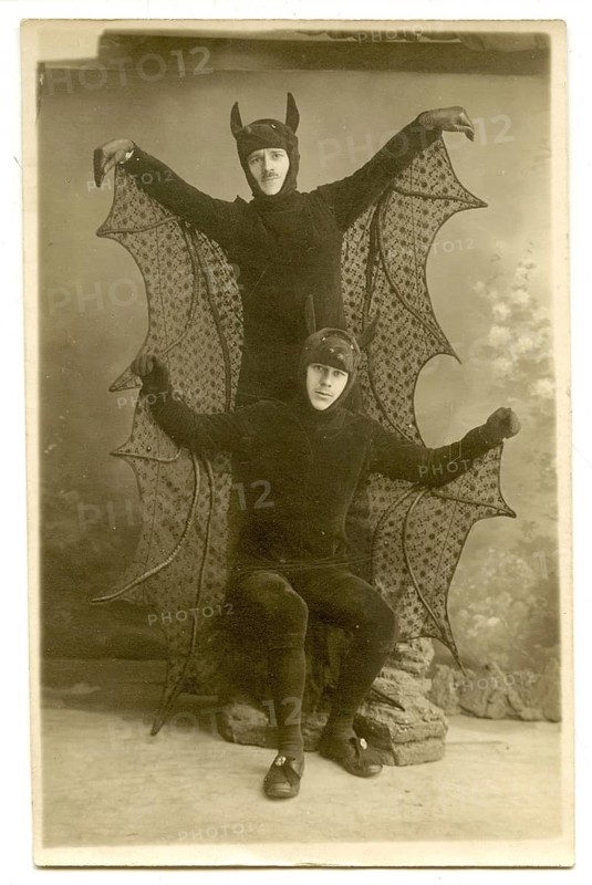 Bat, dance, costume, disguise, theatre, twenties, two people in bat costumes pose dramatically in a vintage photo, around 1928