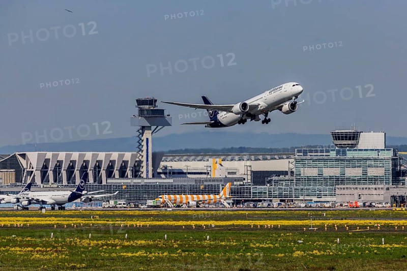 Plane taking off from Fraport Airport in Frankfurt. Tower. FRA, EDDF. Aircraft number plate: D-ABPC, Lufthansa, Boeing 787-9 Dreamliner. Frankfurt am Main, Hesse, Germany
