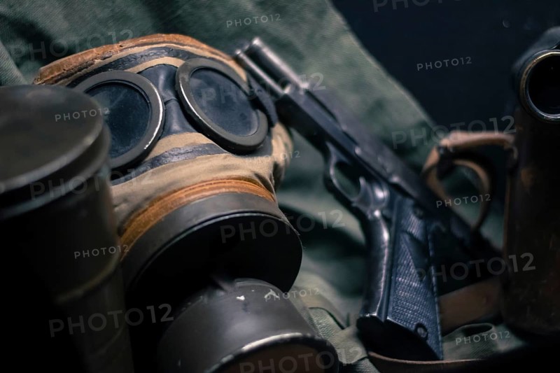Laid pistol, mask and other accessories of WW2. Germany