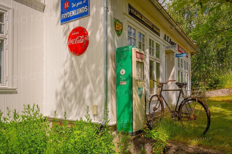 View of an old gas station with an old bicycle parked in front of it, Nedre Eggedal, Buskerud, Norway