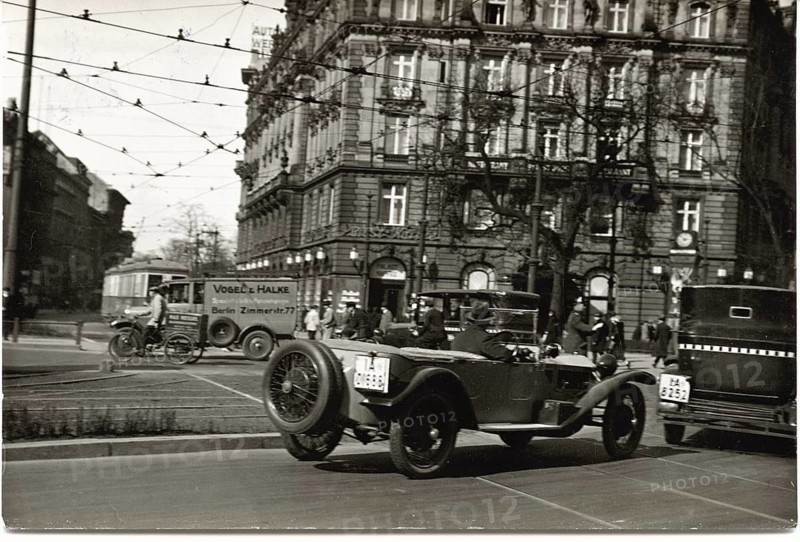 Berlin, Mitte, Potsdamer Platz, traffic, taxi, delivery van, tram, twenties, summer, vintage cars and a bus at a busy intersection in front of a historic building, Sasha Stone, around 1928