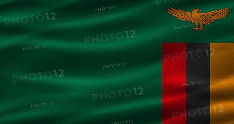 Zambian flag with fabric texture. Realistic flag of Zambia waving