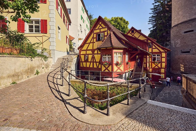 Schlossmühle, watermill, houses, metal railings, gardens, trees, stone staircase, sidewalk, paving stones, blue sky, cloudless, climbing road, Meersburg, Lake Constance, Lake Constance, Baden-Württemberg, Germany