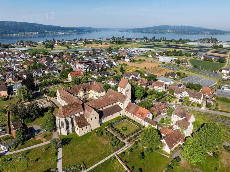 Aerial view of the island of Reichenau, in western Lake Constance, Untersee, with the cathedral of St. Maria and Markus and the Reichenau monastery, former Benedictine abbey in the district of Mittelzell, on the horizon the Thrugauer Seerücken, on the right the Höri peninsula, Konstanz district, Baden-Württemberg, Germany
