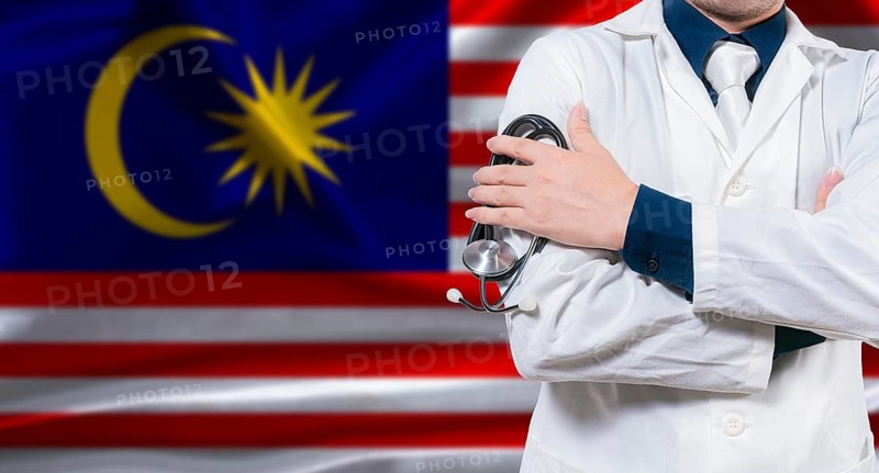 Malaysian national health system, Medical professional holding sthetoscope isolated