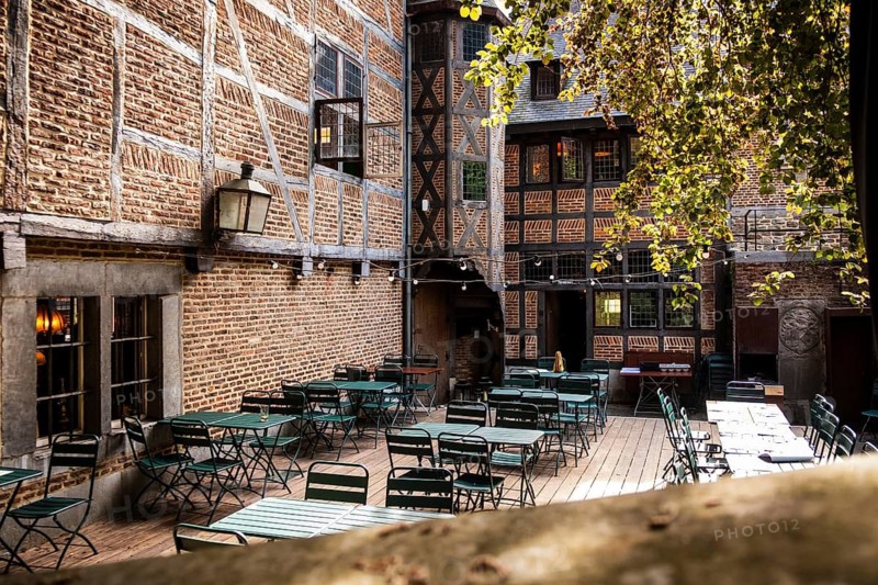 Empty beer garden in a backyard in downtown Liege, Belgium